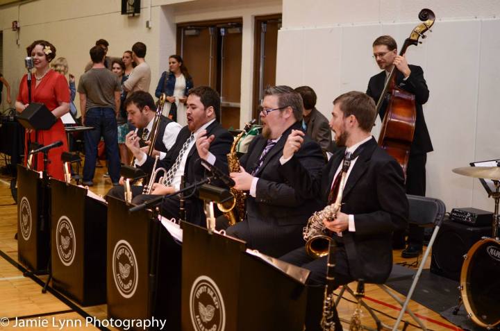 Somewhere between Oscar Aleman and Luciano Pavarotti is the Mint Julep Jazz Band horn section vocals.