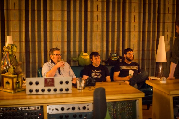 Aaron Hill, Lucian Cobb, and Aaron Tucker taking a break to listen to takes.